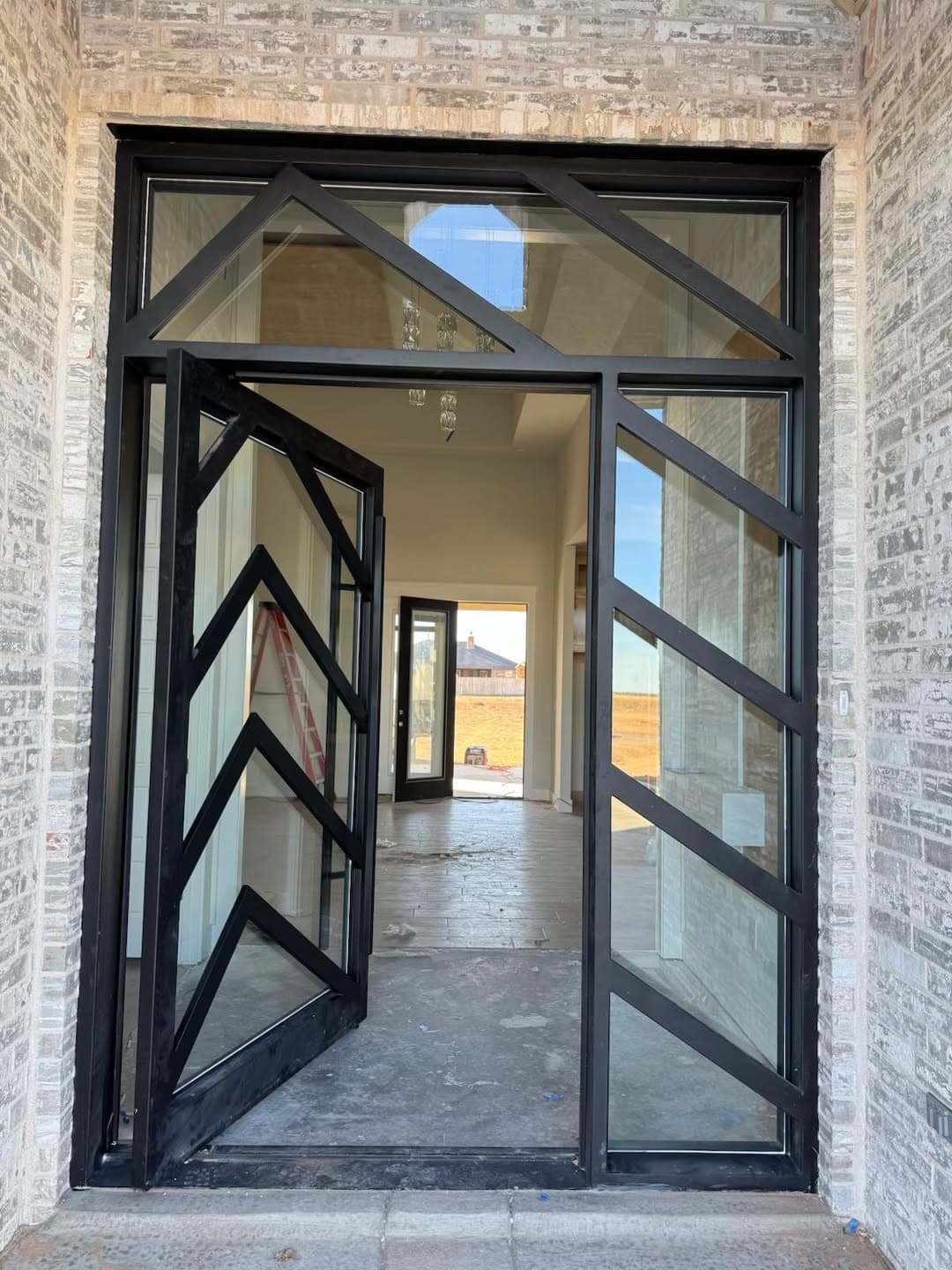Custom iron door detail and hardware